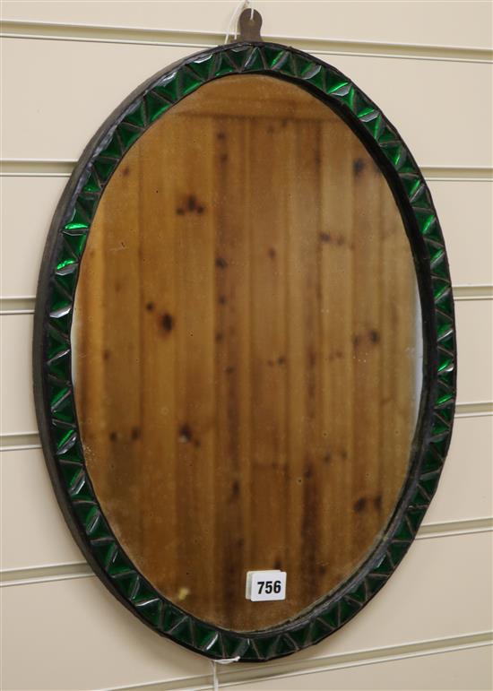 An Irish-style oval mirror W.37cm